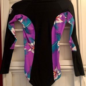 Rip Curl 1 piece long sleeve bathing suit.  New.